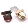 Chiusura L09 4,5 cm per borse disponibile in due differenti versioni: oro e argento.