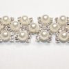 Passamaneria Gioiello argento di altezza 1,5 cm, in strass e perle Articolo venduto al metro. Inserisci la quantità desiderata.